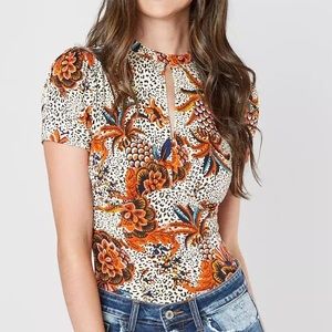 Free People Hear Me Roar cheetah floral keyhole jersey top